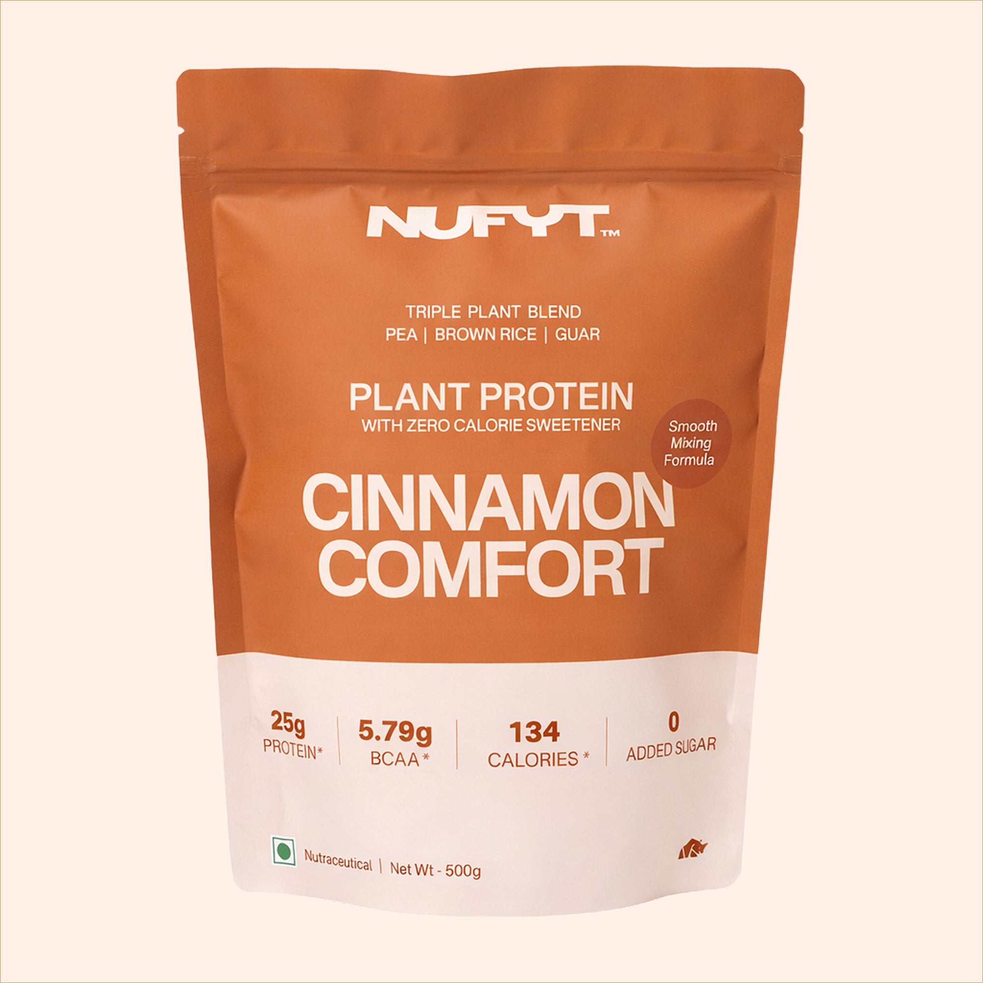 40738732539953 Nufyt Cinnamon Comfort plant protein package with a glass of protein shake, scoop, and cinnamon sticks on a beige background